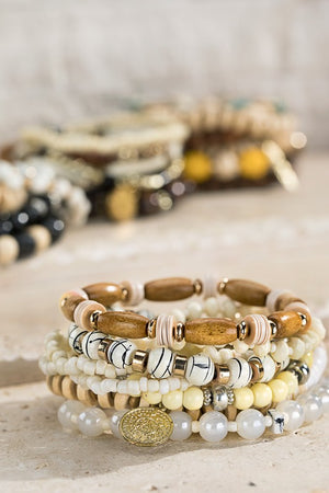 White Beaded Bracelet Set – 8-Piece Ivory & Wood Mix