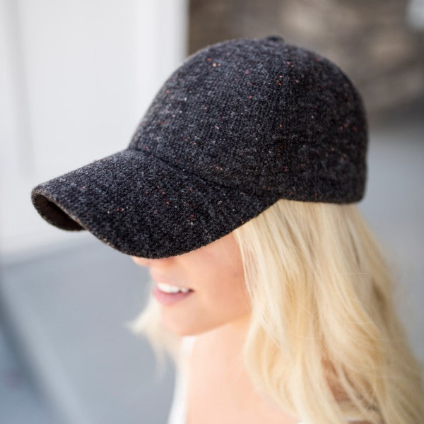 black tweed cap